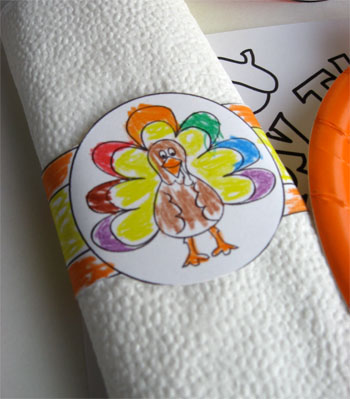 Paper napkin ring holder with turkey colored with crayon