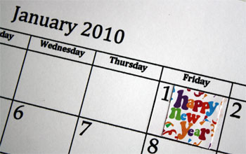 Happy New Year sticker on calendar page 
