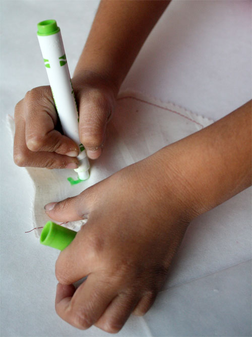Coloring fabric with markers