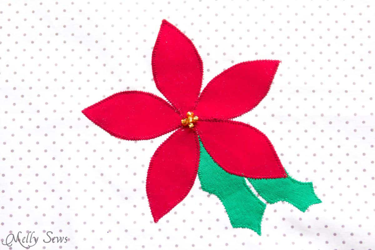 Poinsettia appliqué - sew reusable gift bags and use up your scraps! Sewing tutorial by Melly Sews