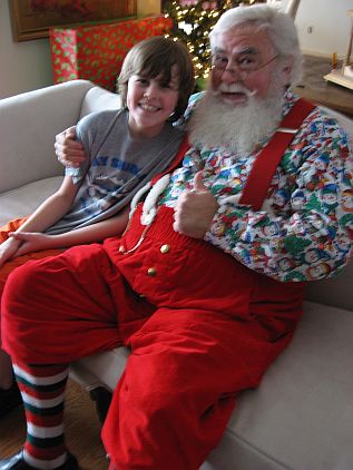 Breakfast with Santa. Santa taking individual photos with each of the boys.  -Skip to My Lou