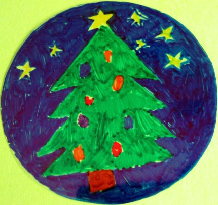Insert for glass ornament with Christmas tree in the night sky with stars covered with transparency and cut  out.