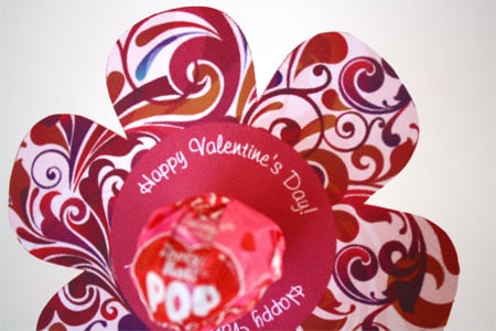floral printed lollipop lily with red center that has the words "Happy Valentine's Day" printed in it