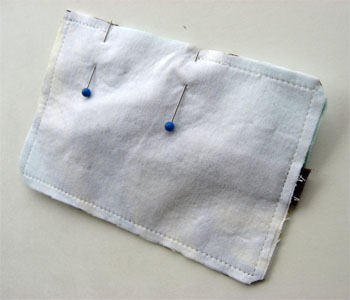 Fabric pieces stitched together with an opening for turning.  Clip corners to ensure fabric is flat when turned.
