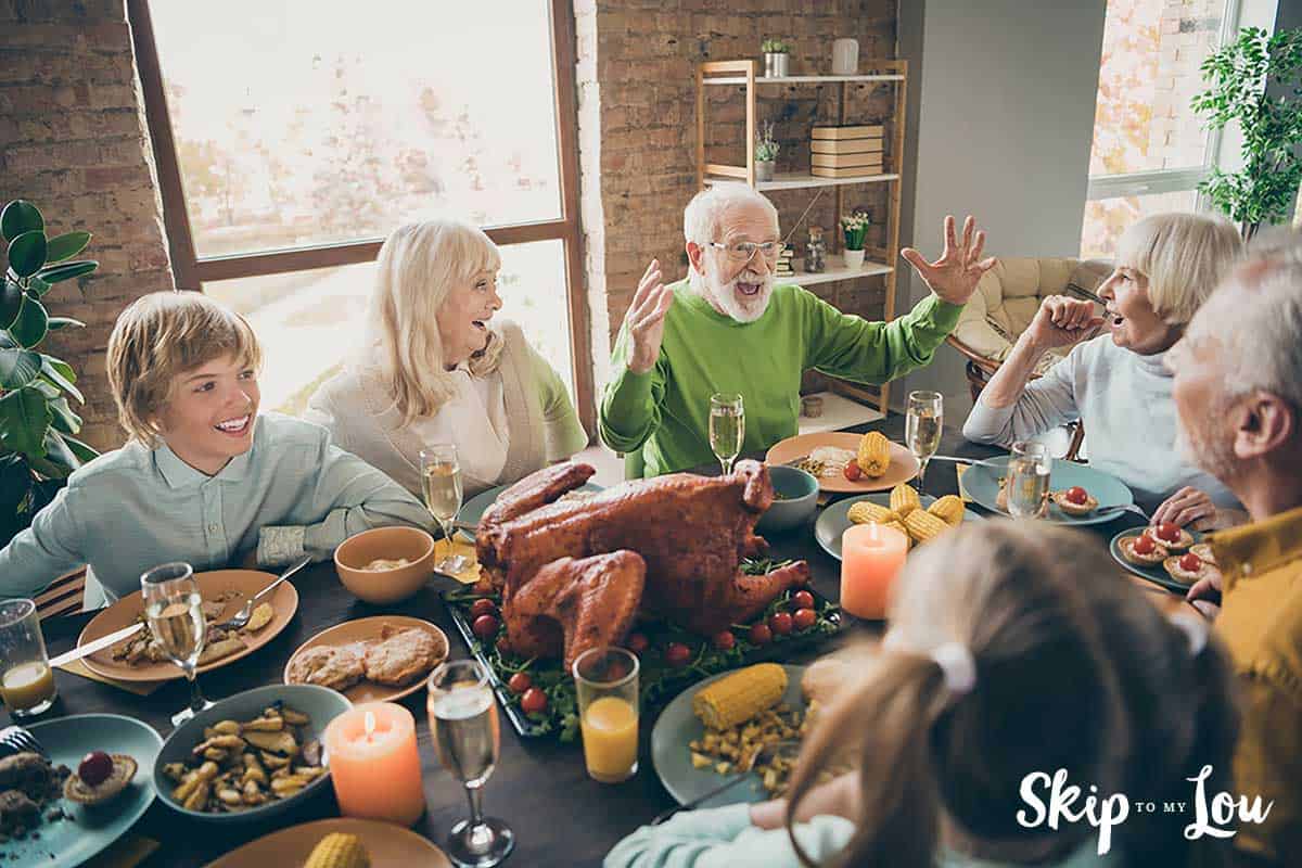 family at Thanksgiving dinner talking