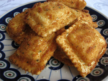 Golden fried ravioli right out of the deep fryer.