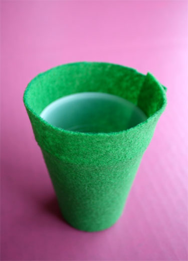 cup wrapped with green felt