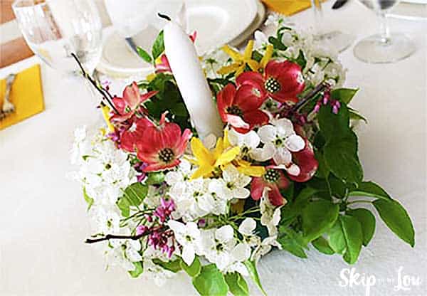 fresh flower centerpiece with candle