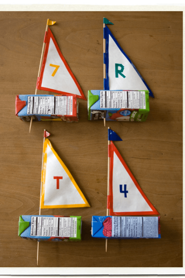 Four Juice Box Sailboats ready to sail