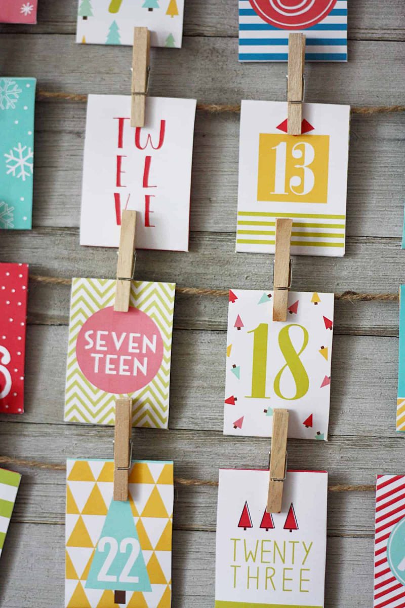 Printable advent calendar with activities hanging on the wall