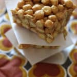 peanut butter treats with wax paper between them