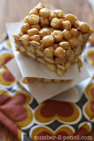 peanut butter treats with wax paper between them