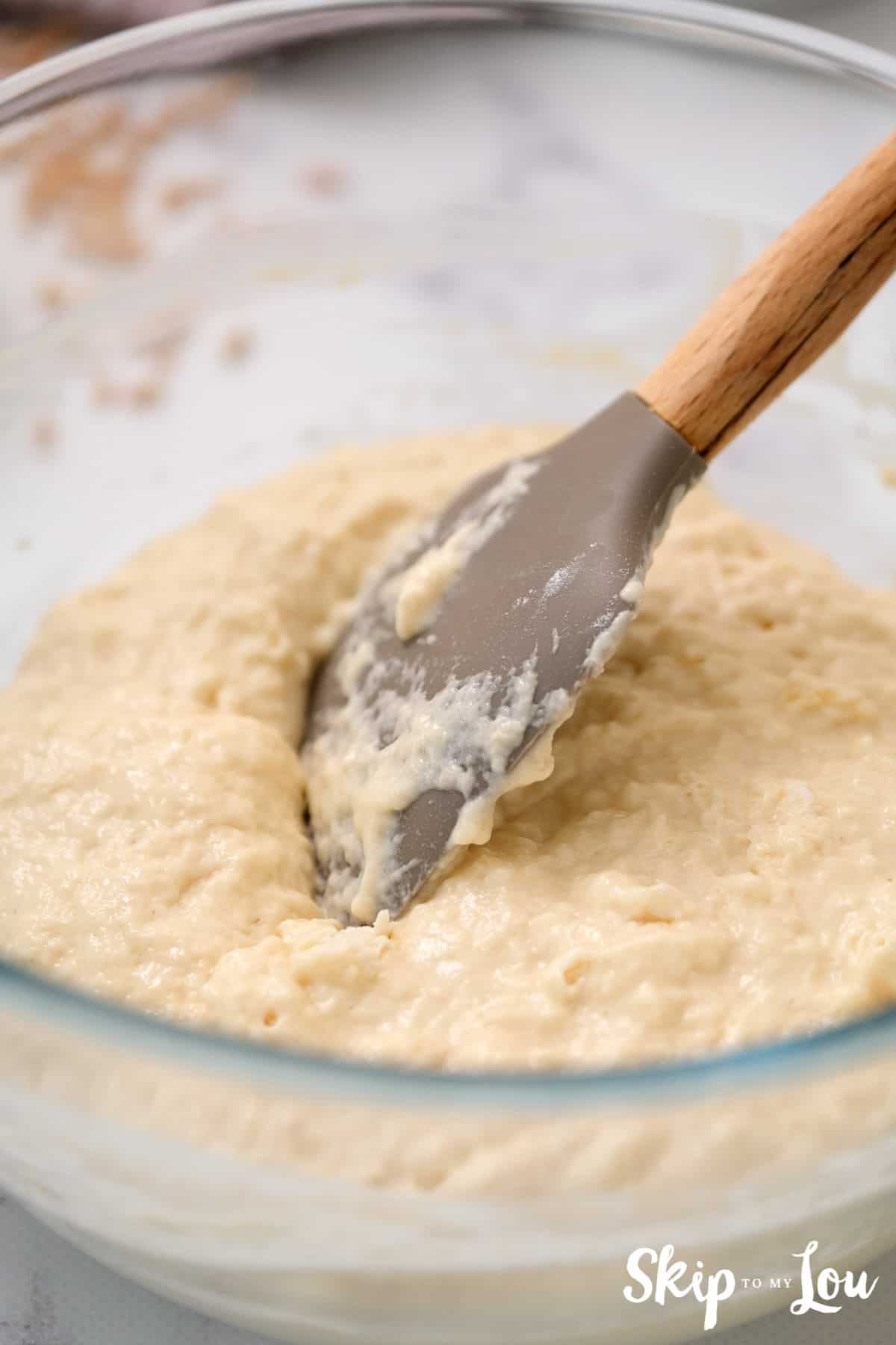 Stir ingredients together for beer bread recipe