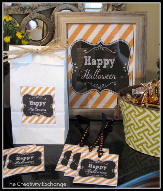 Printable tags and labels. The tags and labels have a black center that reads Happy Halloween on a whte and orange striped background.