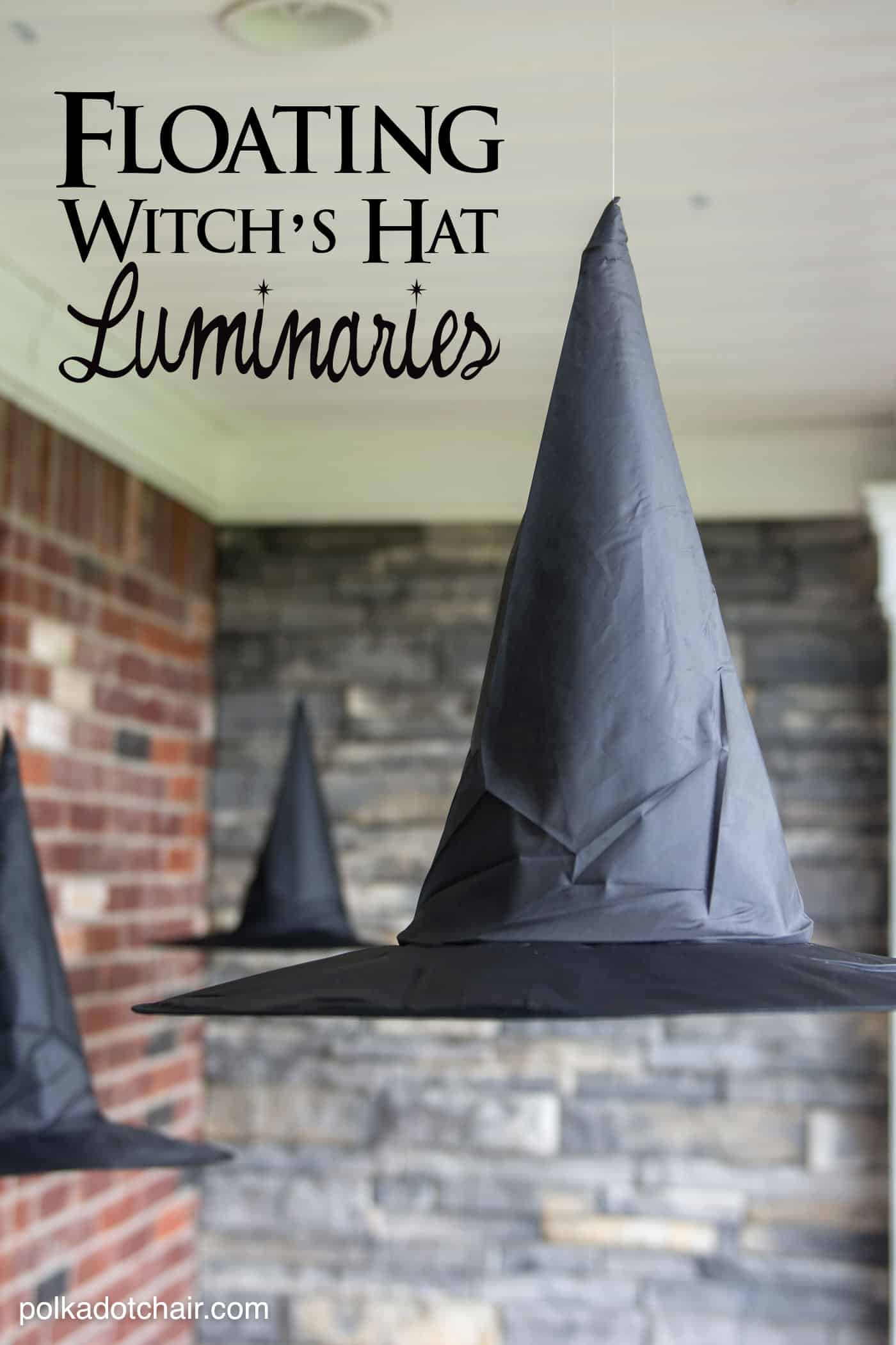Halloween decorations - Floating witch's hat luminaries - three witches hats on hanging from a porch ceiling
