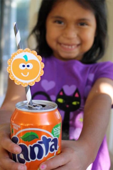 halloween party circle on drink can child holding