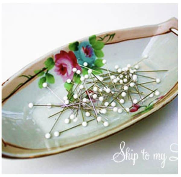 magnetic pin holder mother's day gift idea - porcelian dish decorated with flower print with straight pins on it