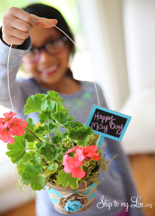 Child holding May Day Basket