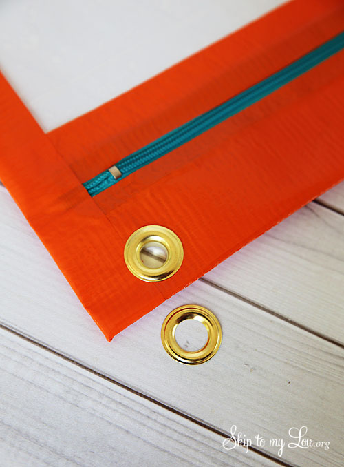 duct tape pencil bag grommet step 1