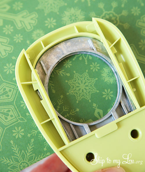 2 inch hole punch and cute green Christmas card stock to be punched out to cover the top of the cup for the recycled advent calendar.
