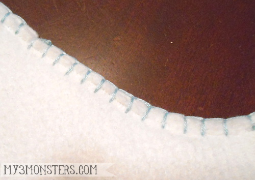 blanket stitch details around stocking