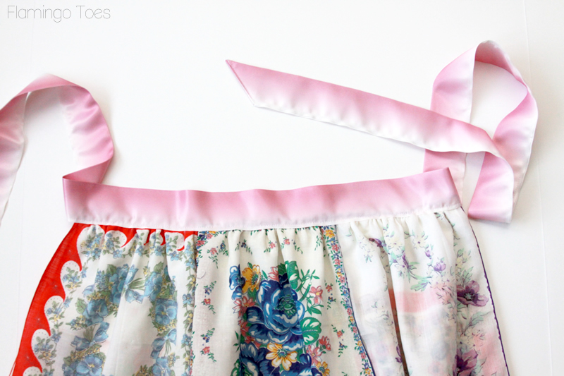 sewing ribbon to apron