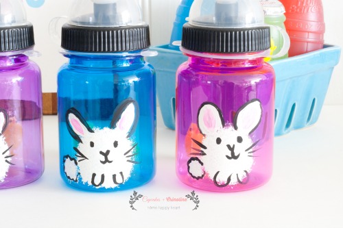 Close up of hand-apinted bunnies on water bottles from cupcakesandcrinoline.com