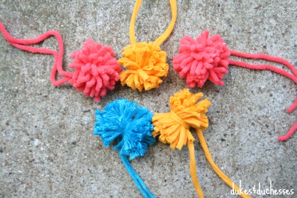 bright yarn pom poms