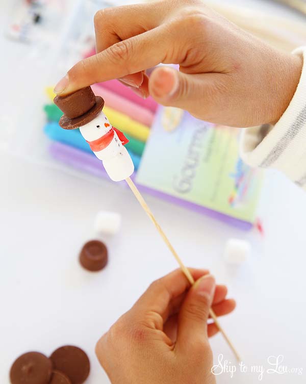 making snowman stirrers