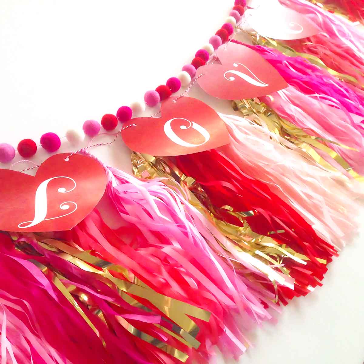 Valentine's Day heart banner + tissue tassels + felt balls