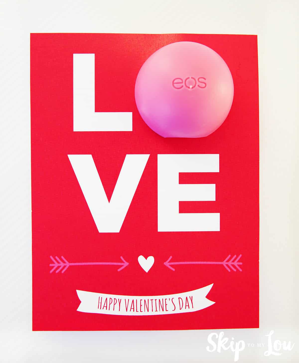 EOS Lip balm as the O in the red valentine card with LOVE on the card