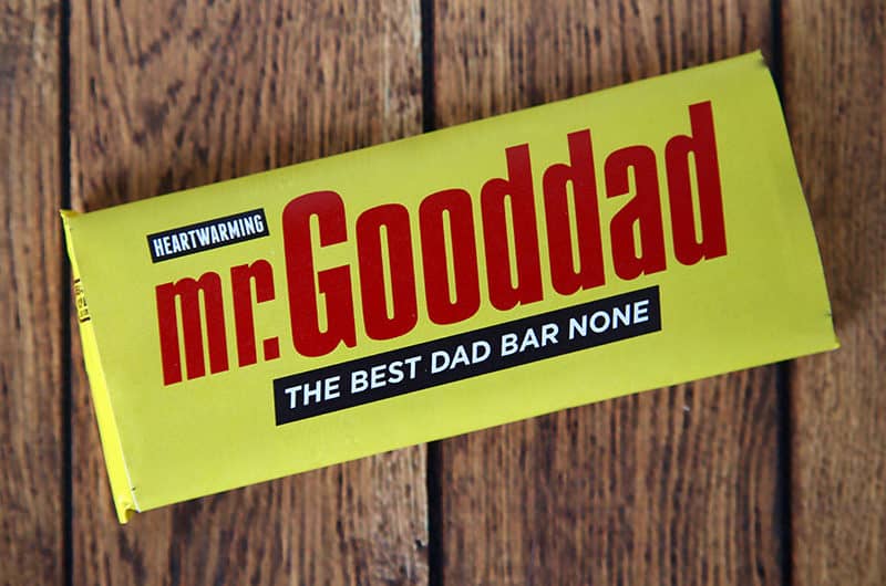 fathers day printable candy bar wrapper gift idea; the wrapper says heartwarming mr. good dad the best dad bar none; yellow wrap with black and white banners and red font