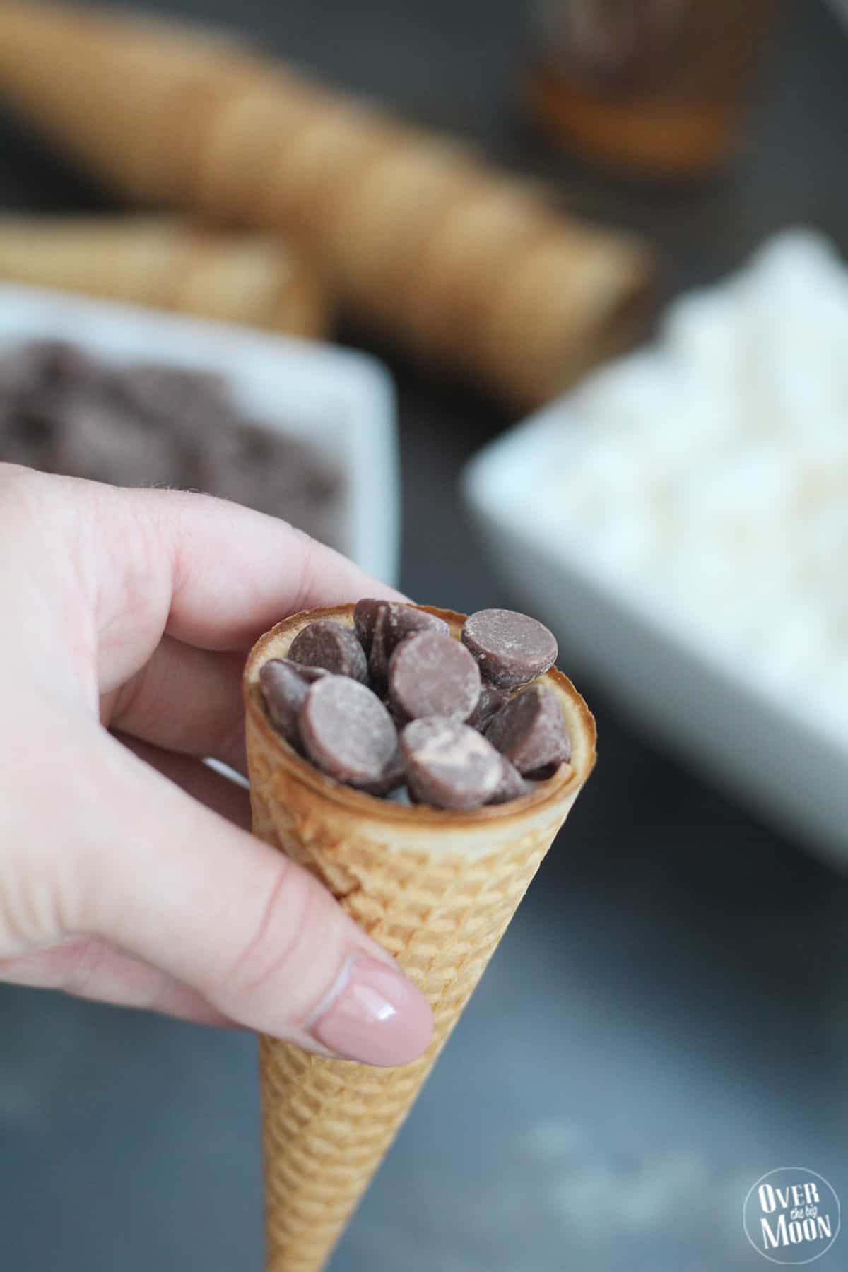 Sugar Cone S'mores! This no mess approach to S'mores is the best! You can bake them, BBQ them or cook them in a fire! From www.overthebigmoon.com!