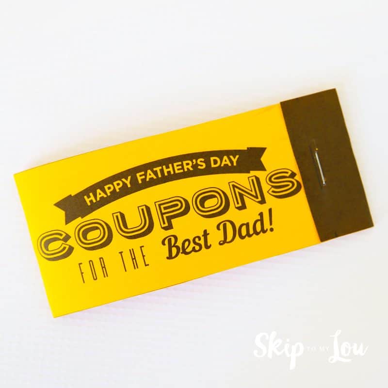 completed father's day coupon book closed and ready to gift; the cover says happy father's day coupons for the best dad!