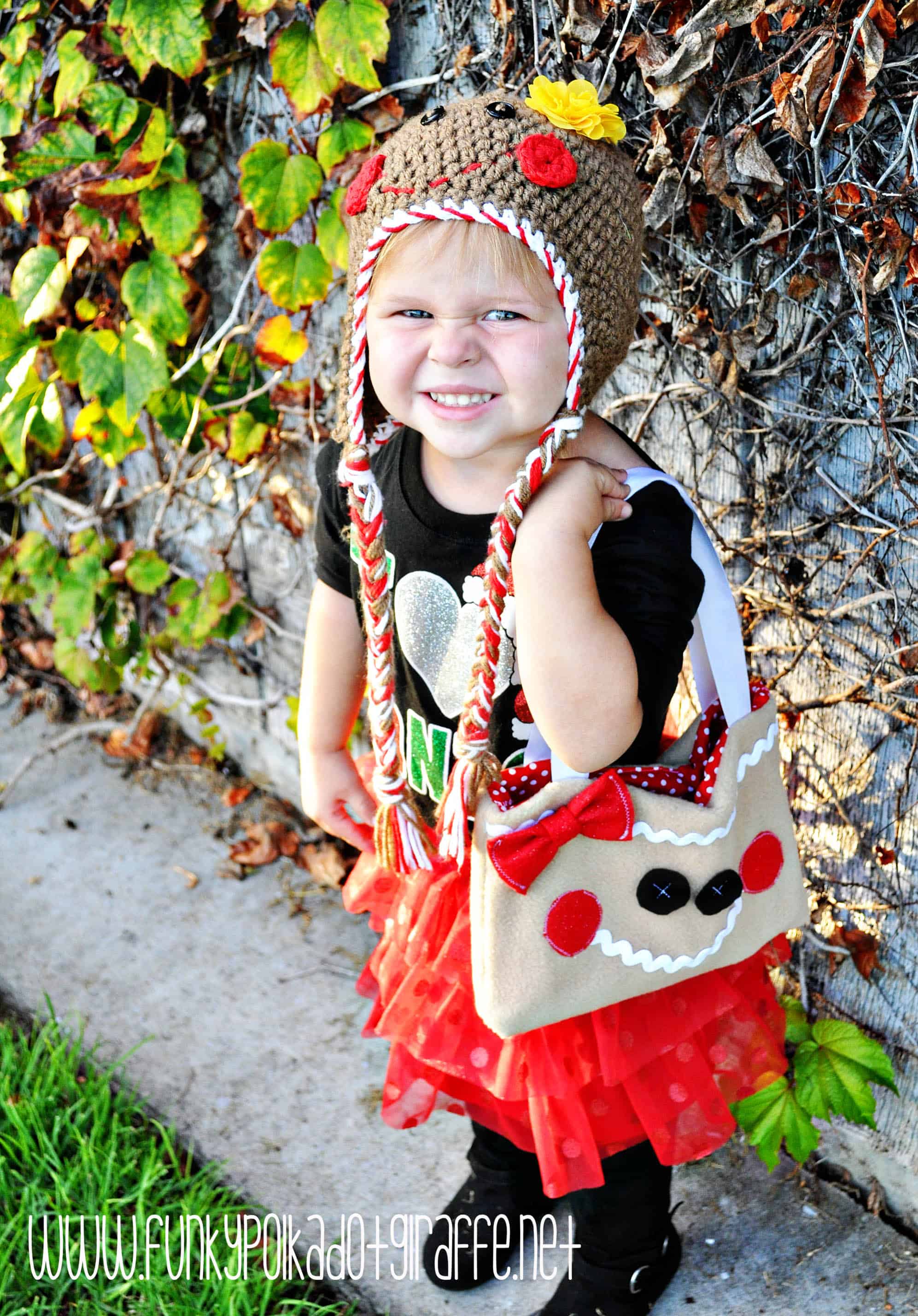 WWW.FUNKYPOLKADOTGIRAFFE.NET Young girl carrying the gingerbread purse. -Skip To My Lou