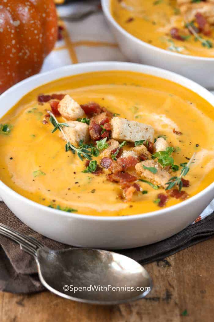 pumpkin soup in white bowl