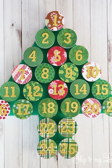 Advent Calendar completed using recycled k-cups glued to a cardboard cut out of a Christmas Tree.