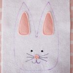 pink bunny nose and ears sewn on to bunny head following the template
