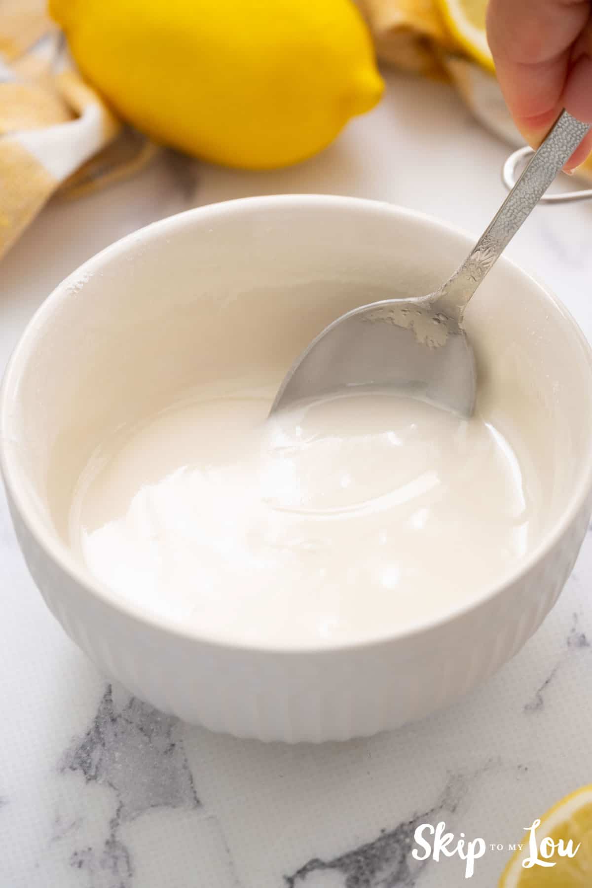 make glaze with powdered sugar and lemon juice for the easy lemon bundt cake