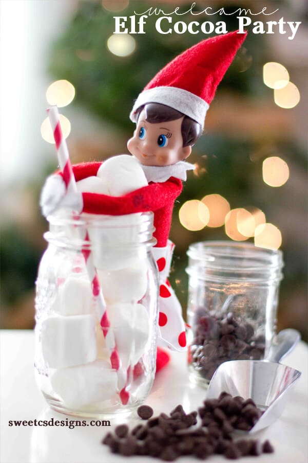 elf hot chocolate party Elf wrapped around a jar with marshmallows and a red and white stripped straw with a second jar of chocolate chips