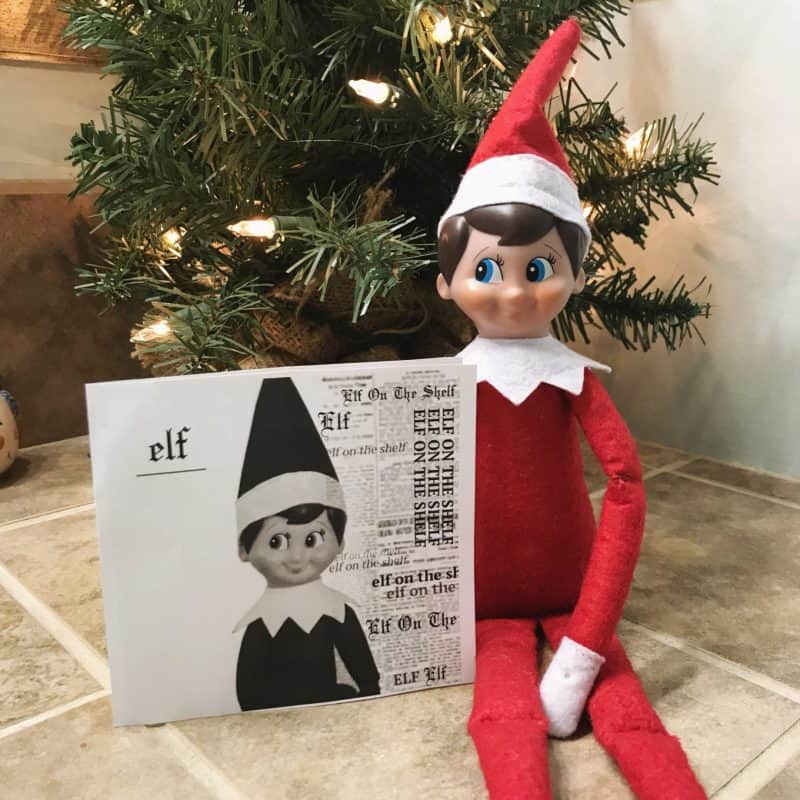 Elf holding Taylor swift style elf printable record cover 