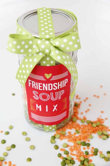 friendship soup mix in a jar with red labels and green ribbon