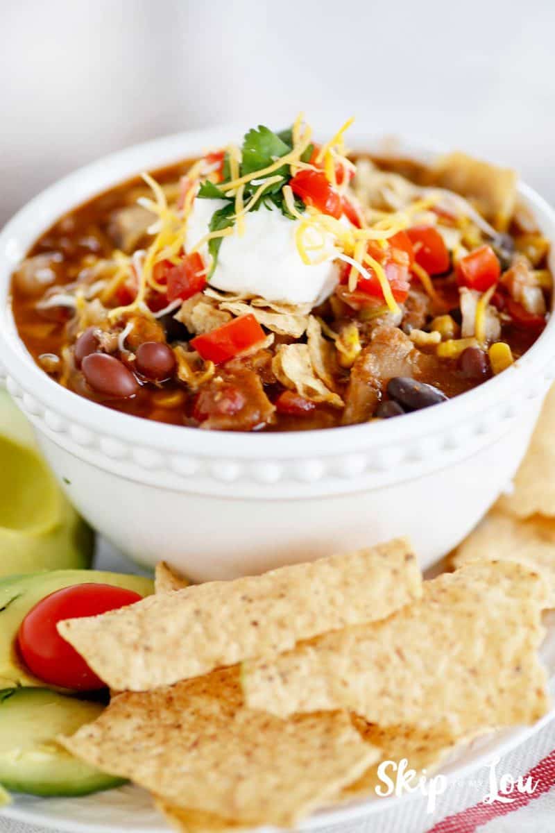 chicken taco soup in white bowl