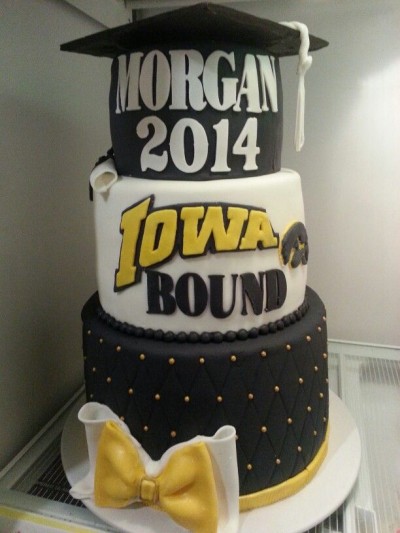tierd cake that says grad name then Iowa bound