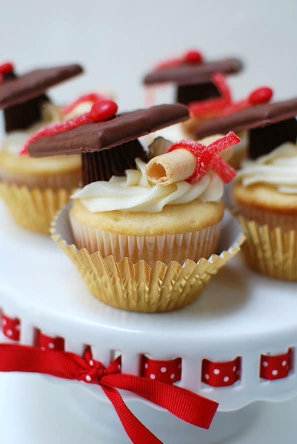 cupcakes with candy hat and cookie diploma