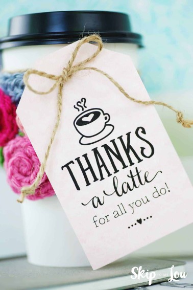 thanks a latte gift tag attached to white take out cup