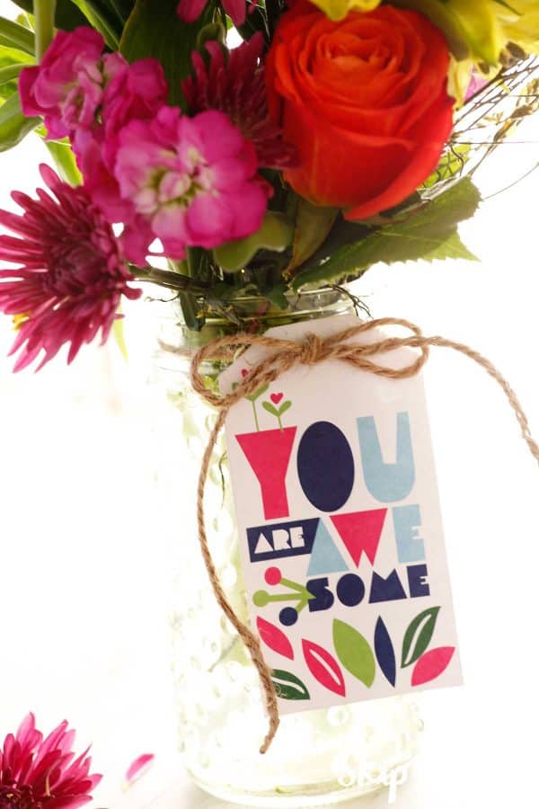 flowers in glass jar with you are awesome tag