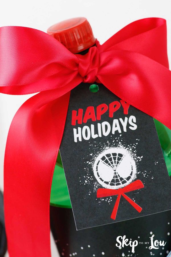 Happy Holidays gift tag on soda bottle