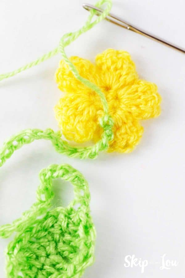 stitch crochet leaf and stem to flower