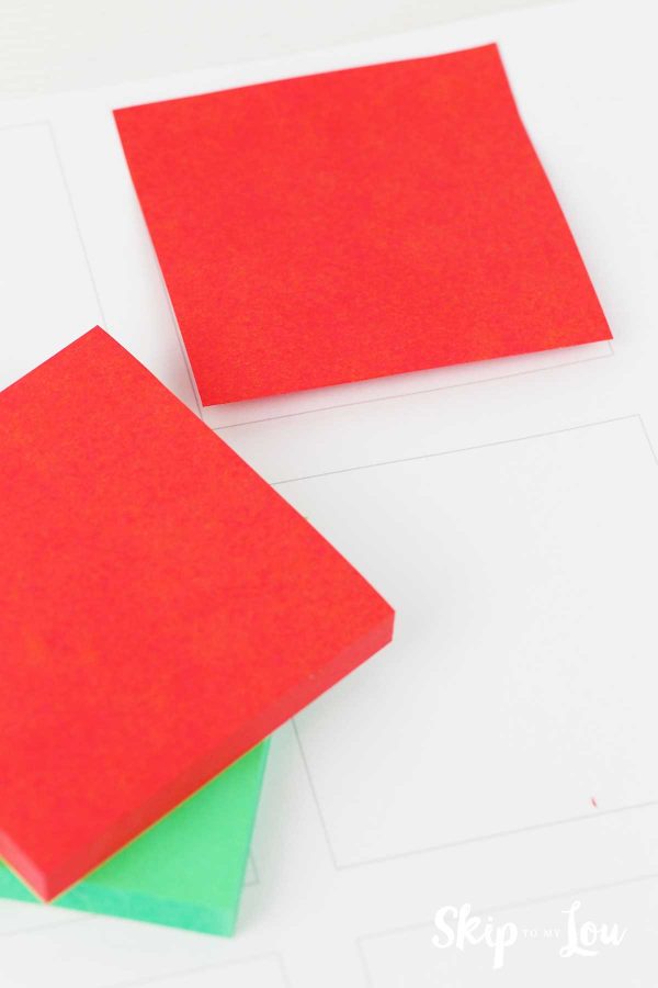 Red and green post it notes on template for the printable Elf on the Shelf notes. -Skip To My Lou